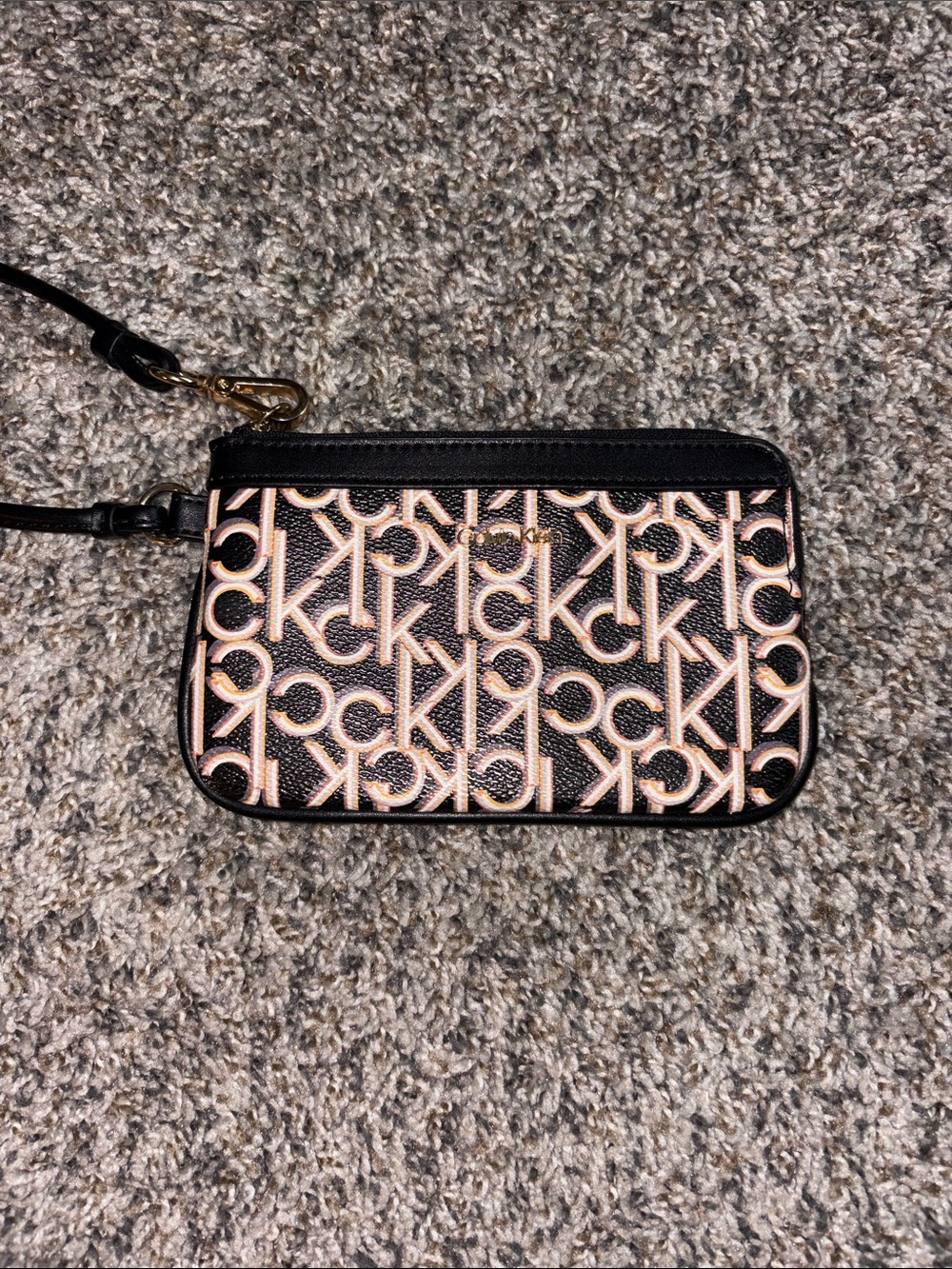 Calvin Klein Black Wristlet with Pink Logo Print